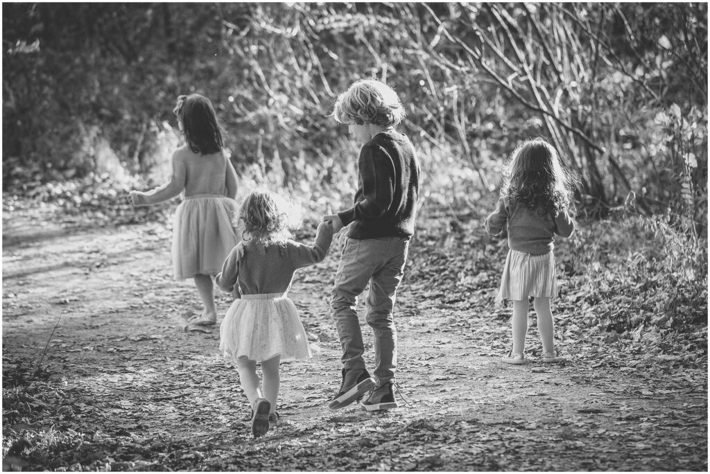 Black and white photo of kids outside
